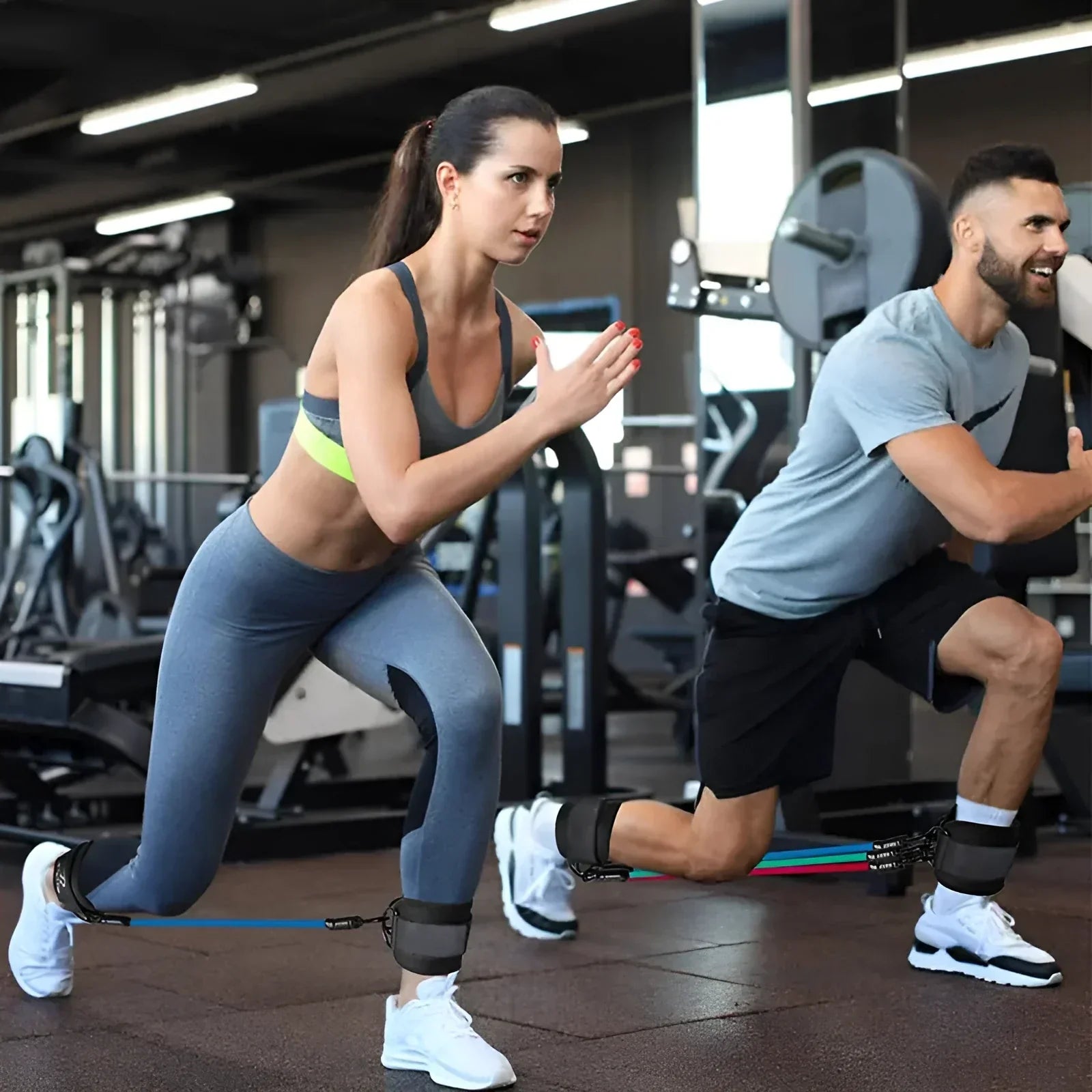 TPE leg resistance band set showing three tension levels with foot loops and storage bag for hip and leg exercises