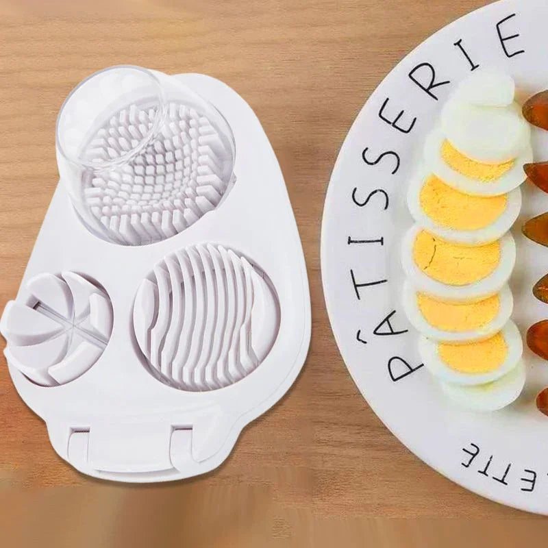 Multi-functional egg slicer tool on wooden table beside plate of sliced eggs from clarioy homeware.